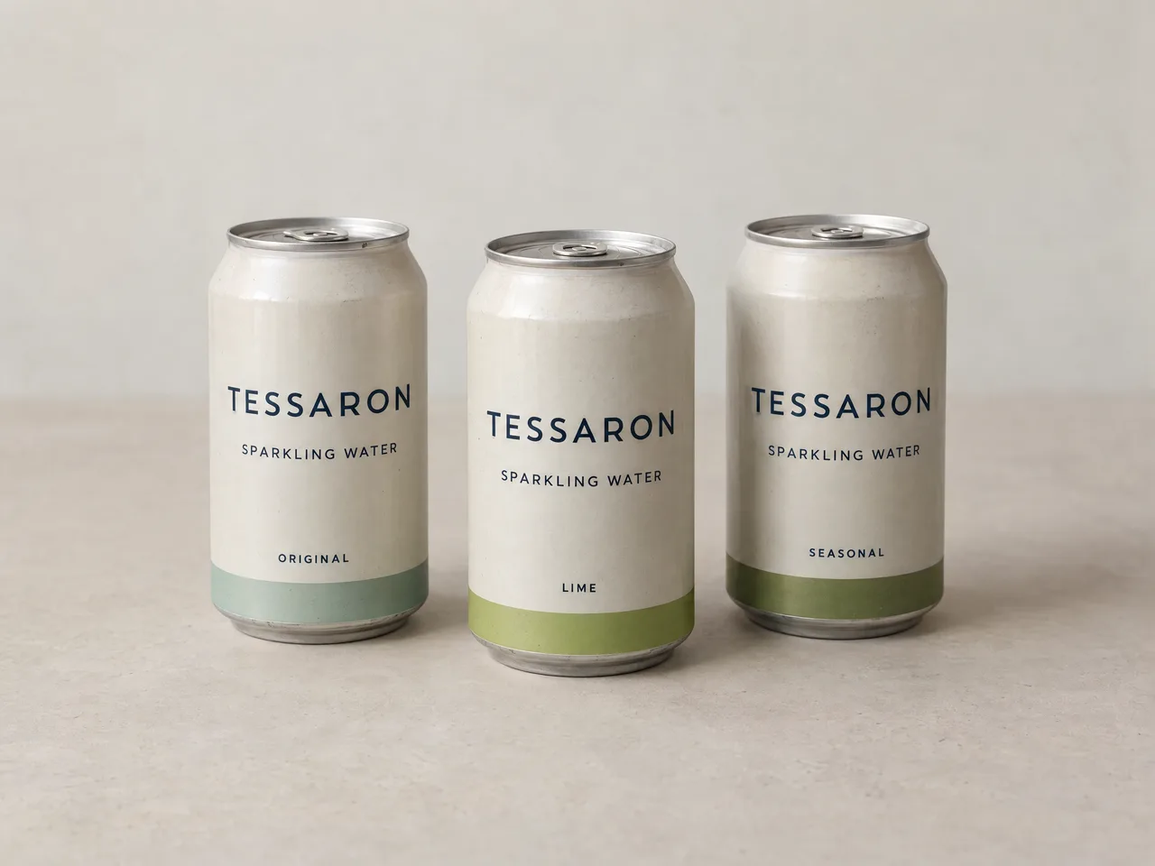 Illustrative Tessaron sparkling water cans on a neutral studio background
